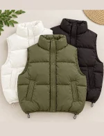 Women's leather puffer vest in white, black, and brown