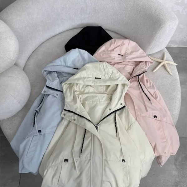 Women's bomber raincoat, free size 38-44, 60 cm length, available in black and cream