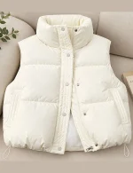 Women's leather puffer vest in white, black, and brown