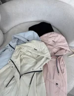 Women's bomber raincoat, free size 38-44, 60 cm length, available in black and cream