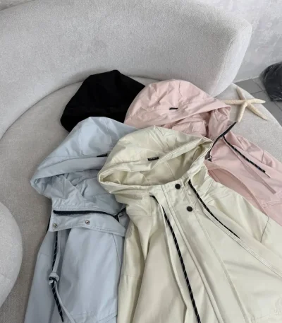 Women's bomber raincoat, free size 38-44, 60 cm length, available in black and cream