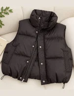 Women's leather puffer vest in white, black, and brown
