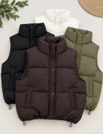 Women's leather puffer vest in white, black, and brown