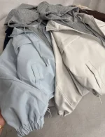 Women's hooded bomber raincoat, free size 38-44, 60 cm length, black blue and brown